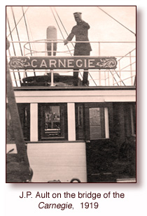 J.P. Ault on the bridge of the Carnegie ship, 1919